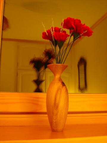Flowers in wooden vase